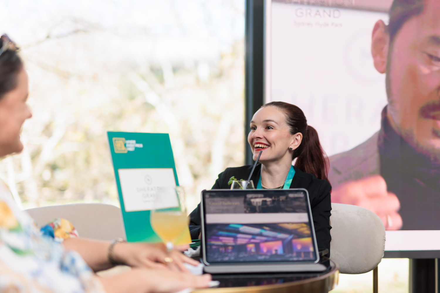 A guest connecting with an exhibitor at the Sydney showcase